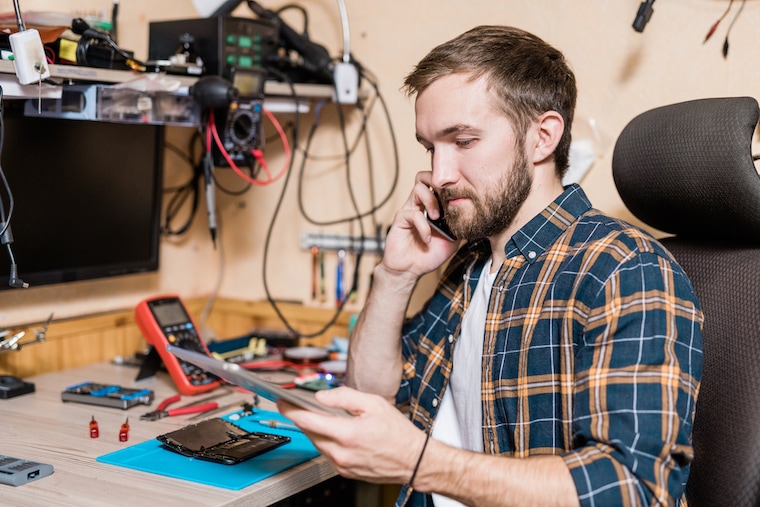 How do i set up and register a phone repair business?